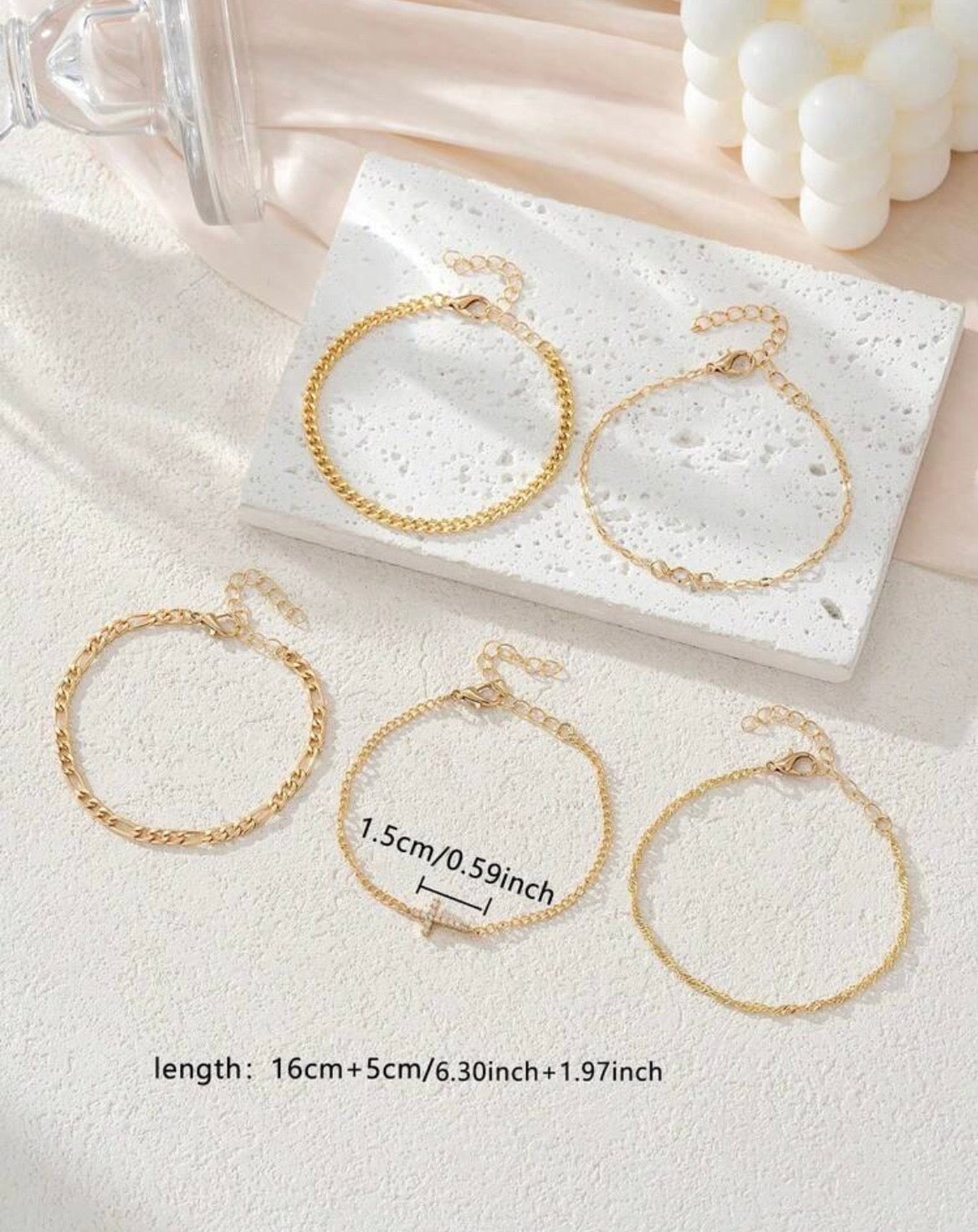Multilayered cross bracelet