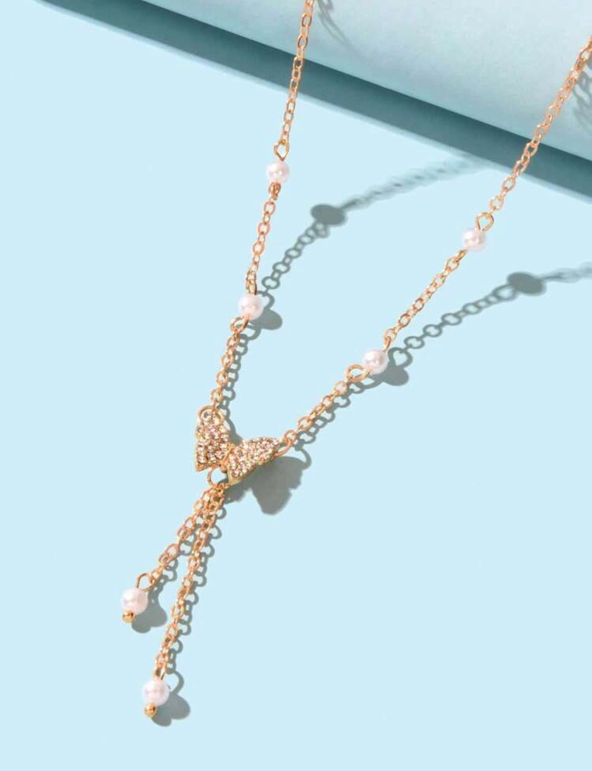 Butterfly pearl necklace