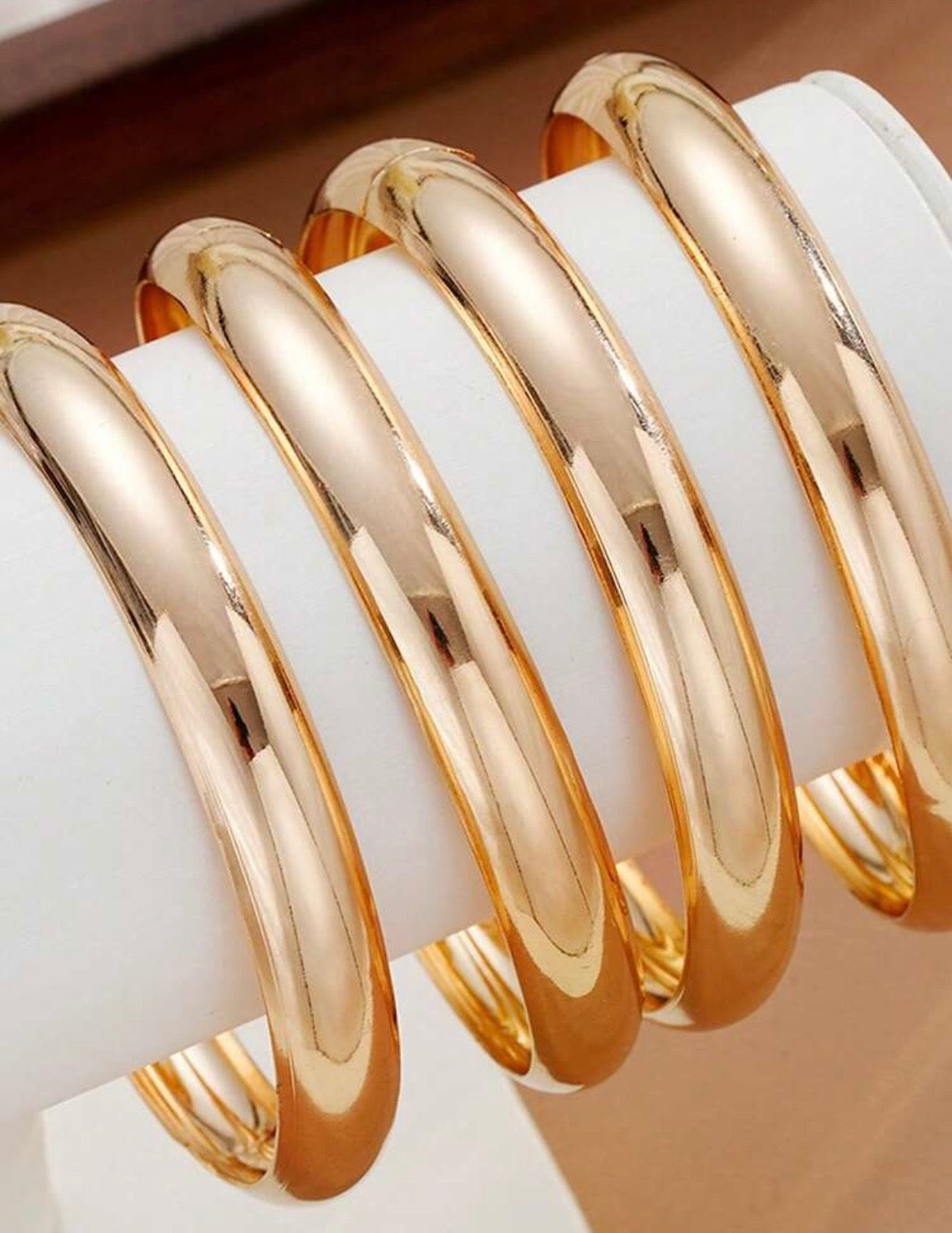 Gold bangles (set of 4)