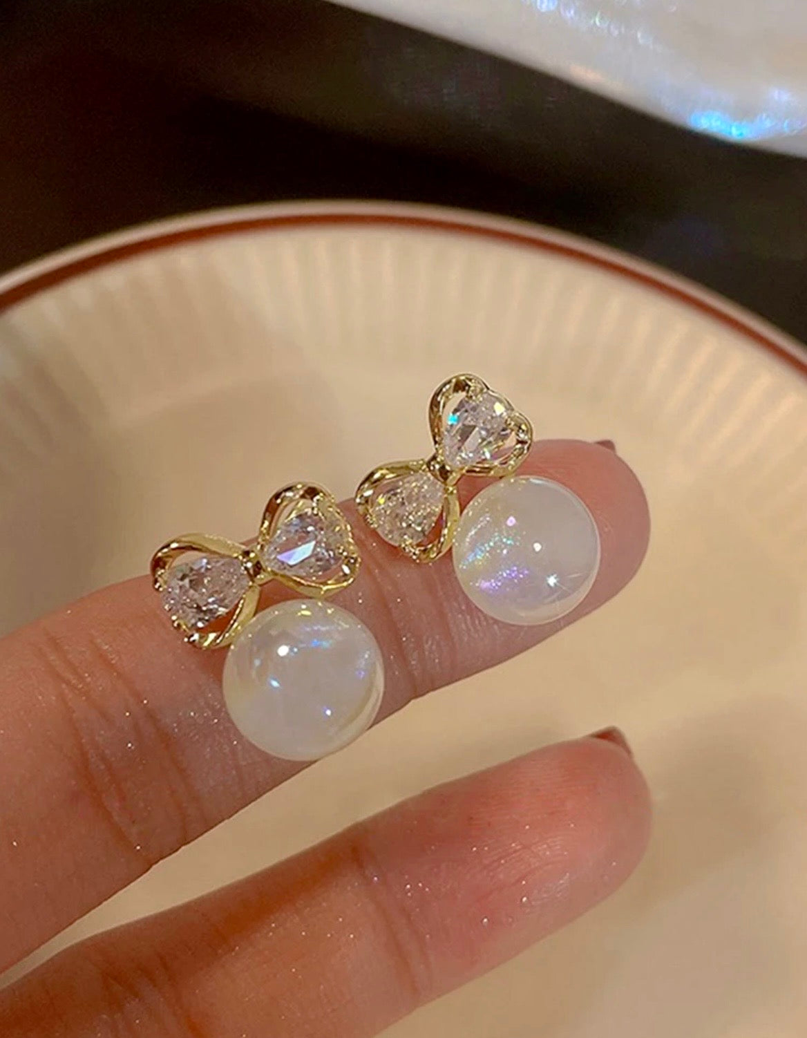 Bow knot pearl earrings