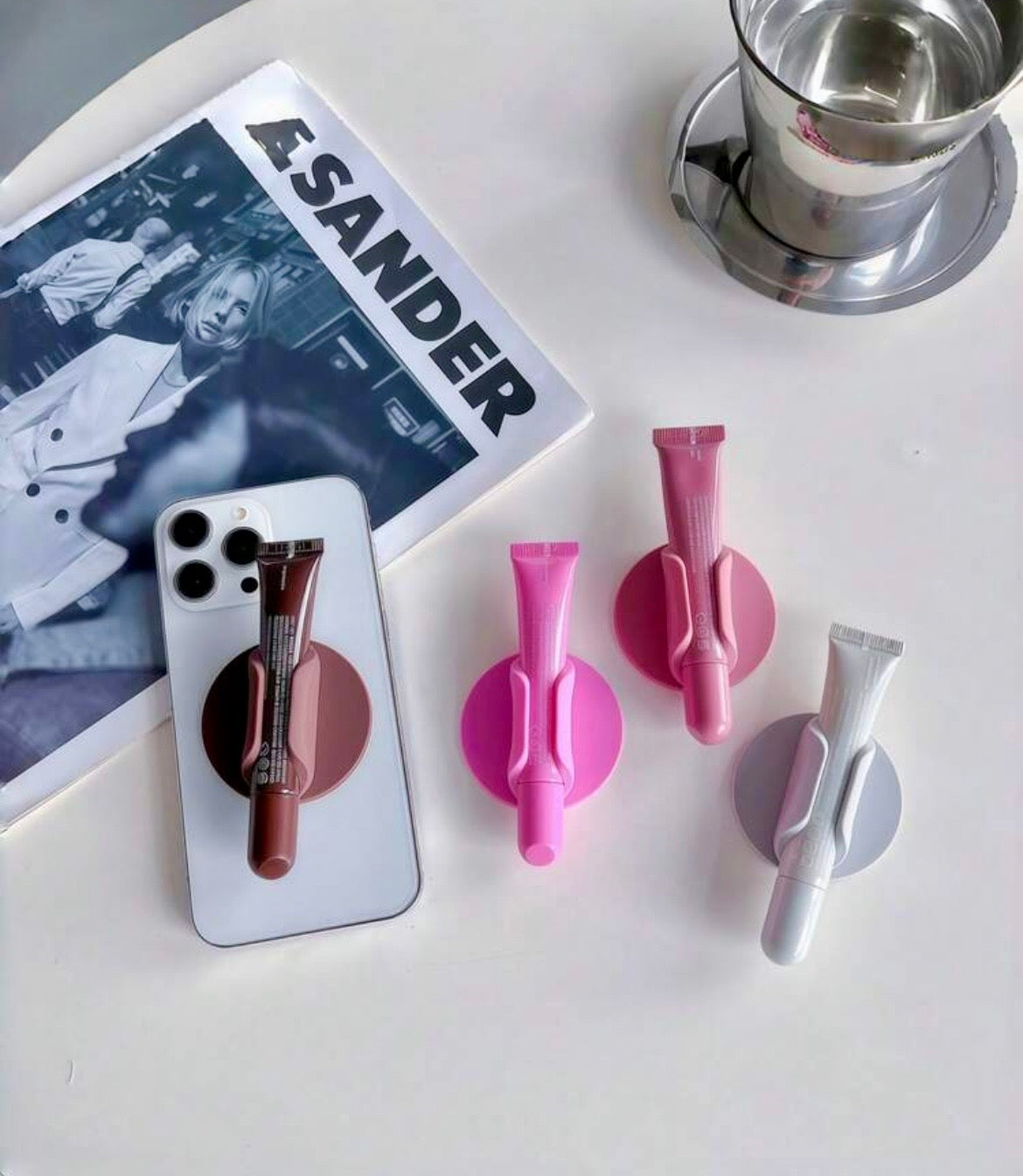 Lip gloss shaped phone holder