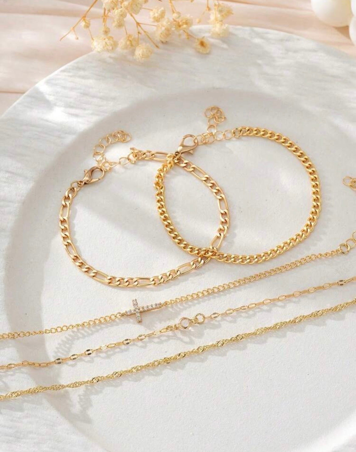 Multilayered cross bracelet