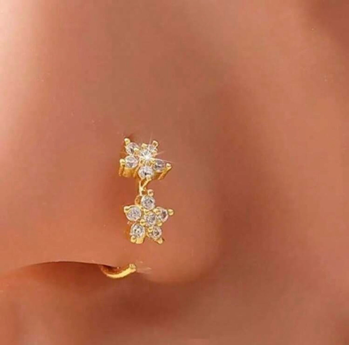 Patterned hoop nose rings