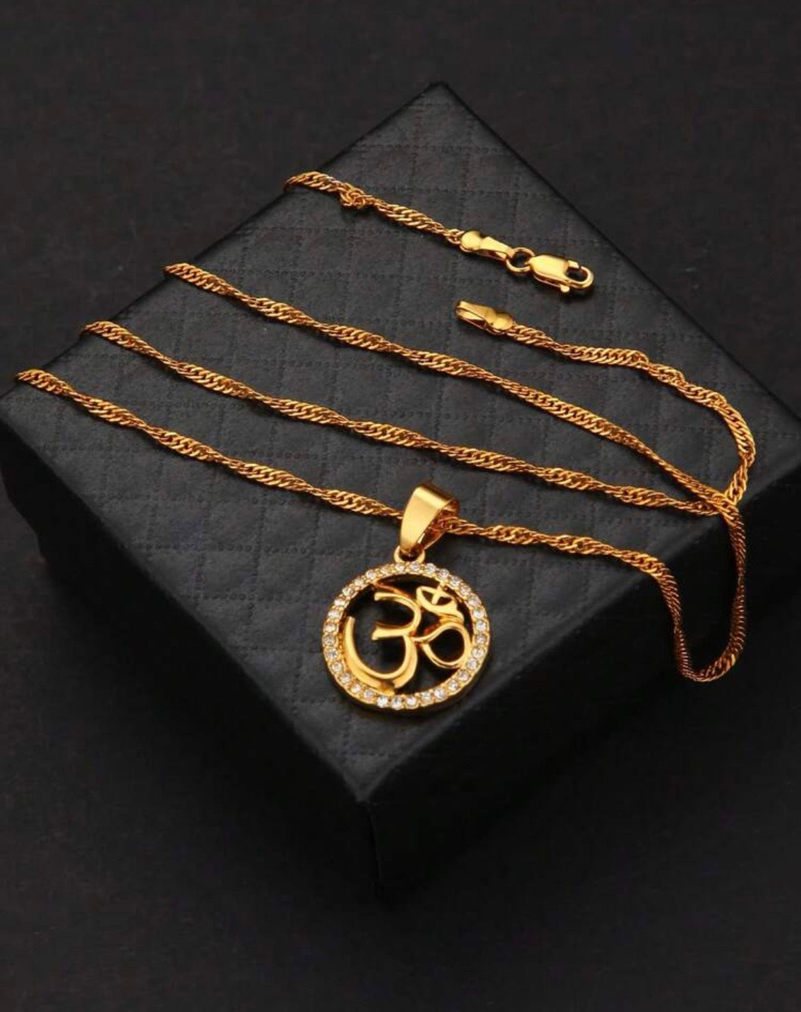 Om pendant necklace