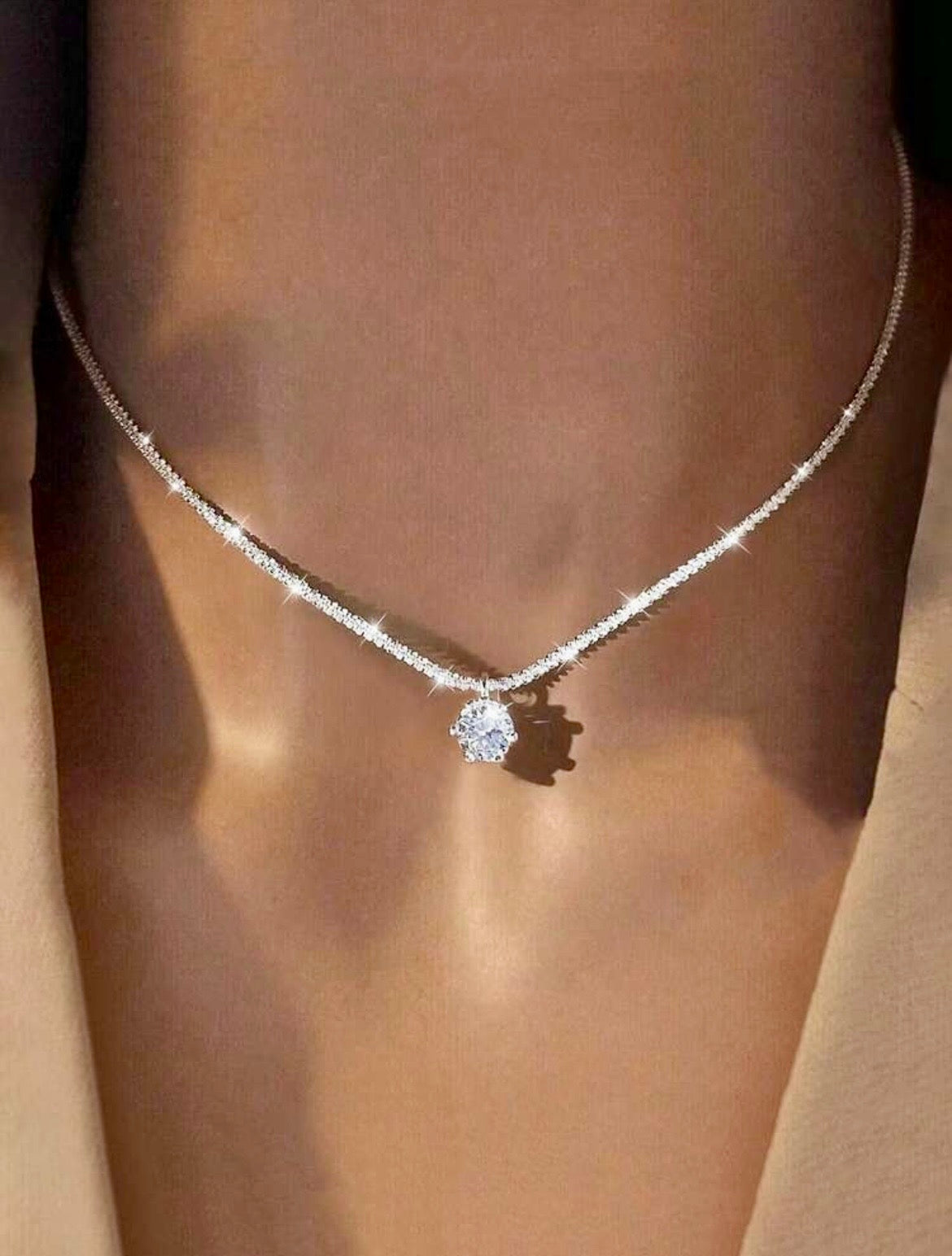 Sparkling silver necklace with diamanté pendant