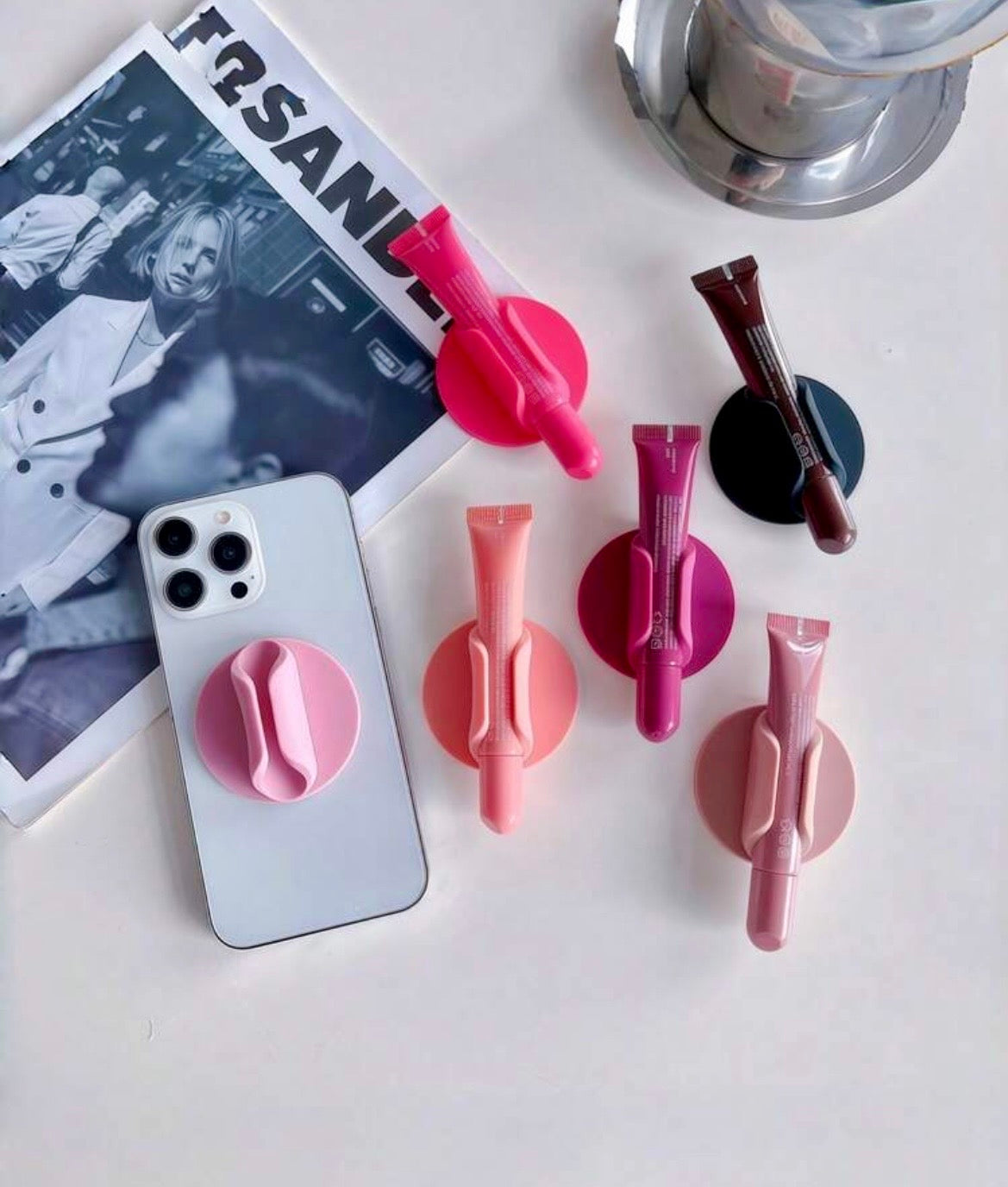 Lip gloss shaped phone holder