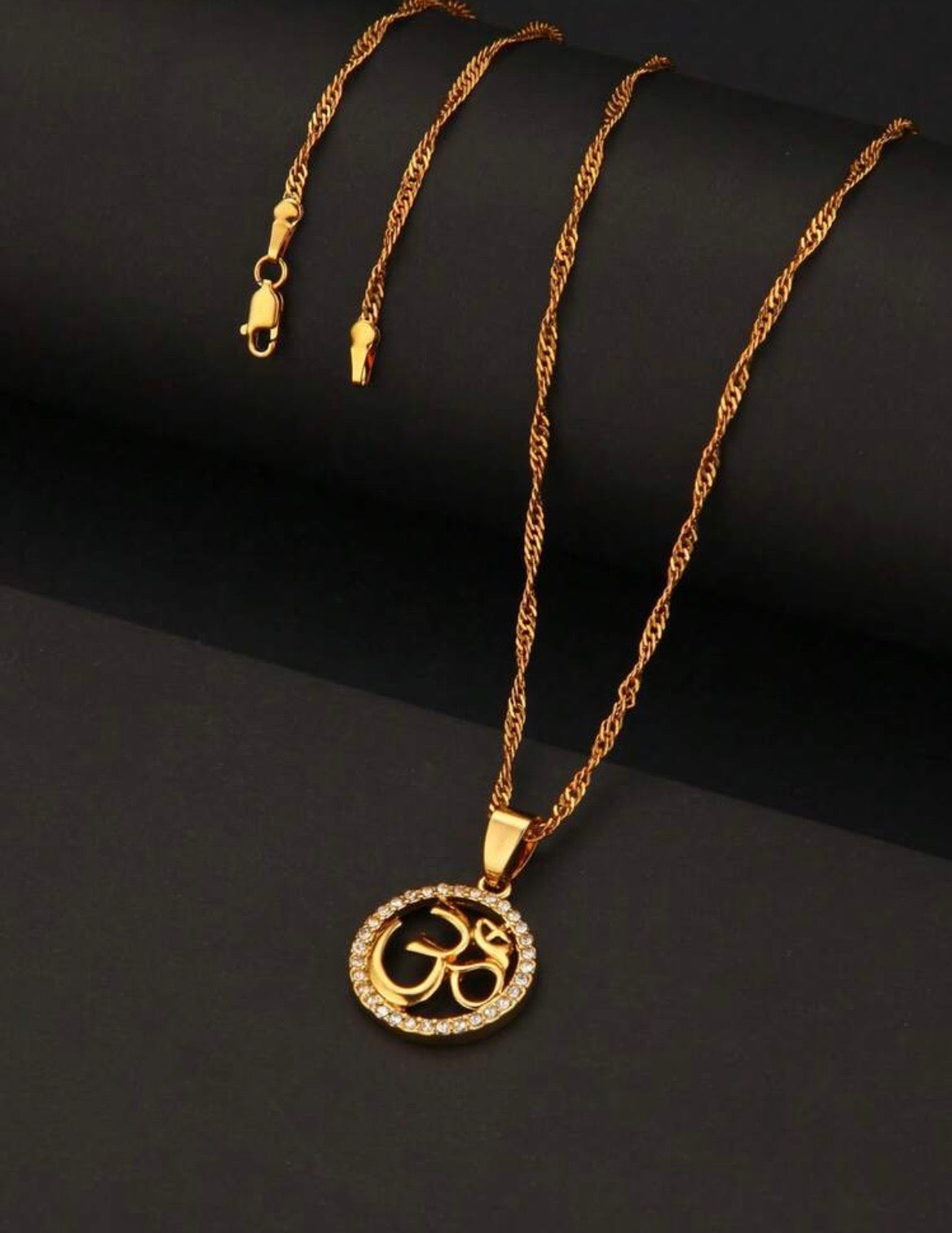 Om pendant necklace