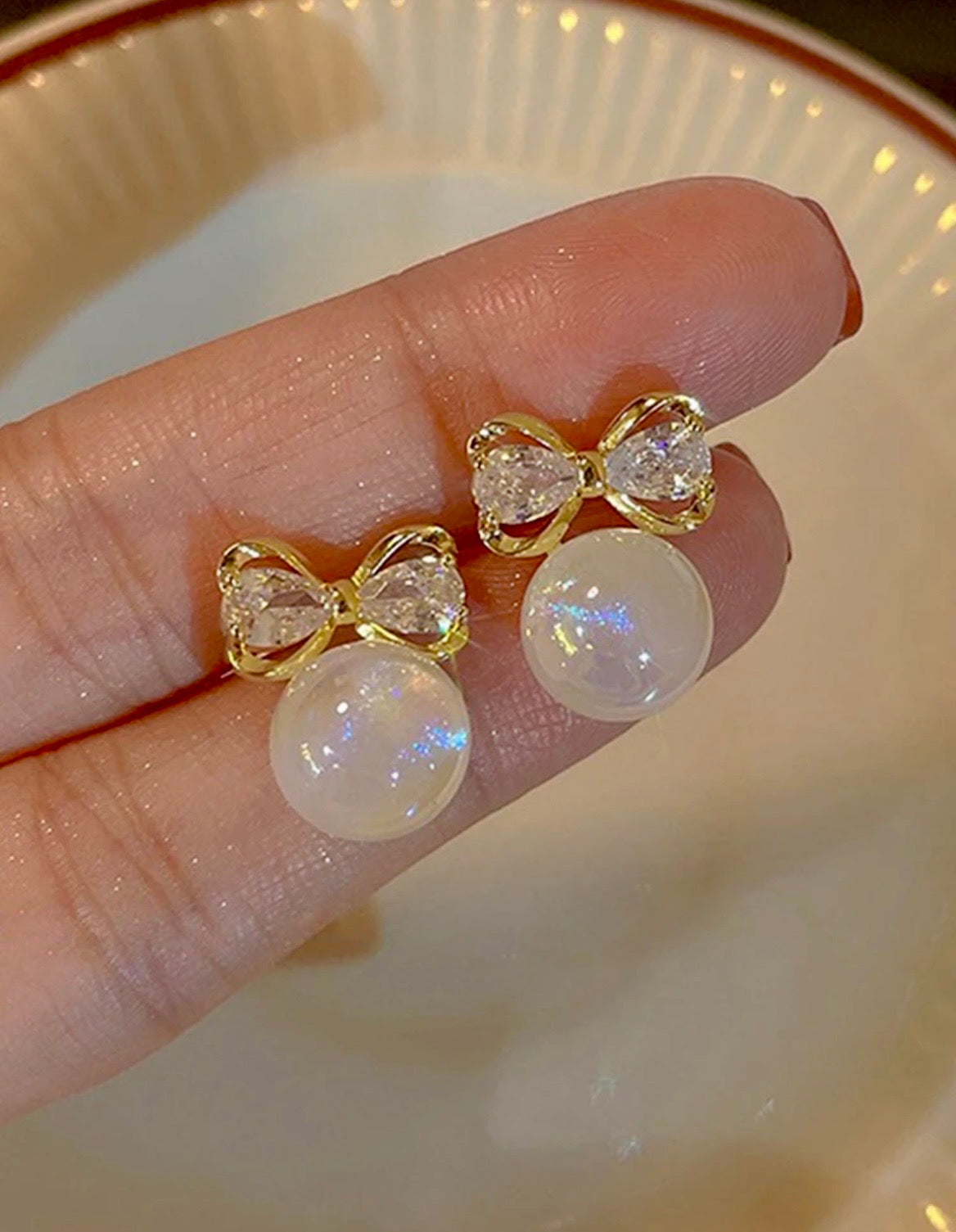 Bow knot pearl earrings