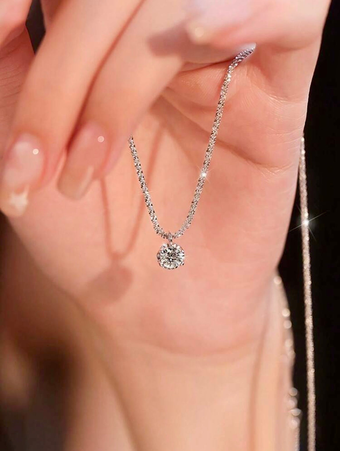 Sparkling silver necklace with diamanté pendant
