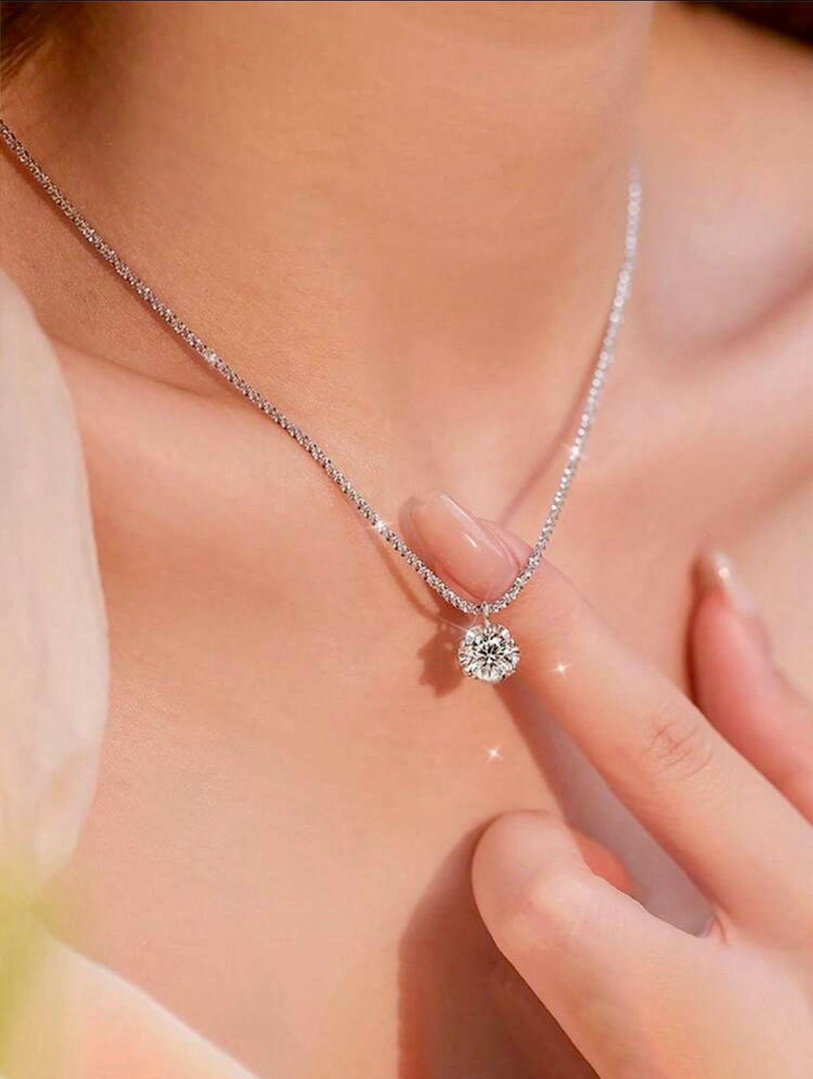 Sparkling silver necklace with diamanté pendant
