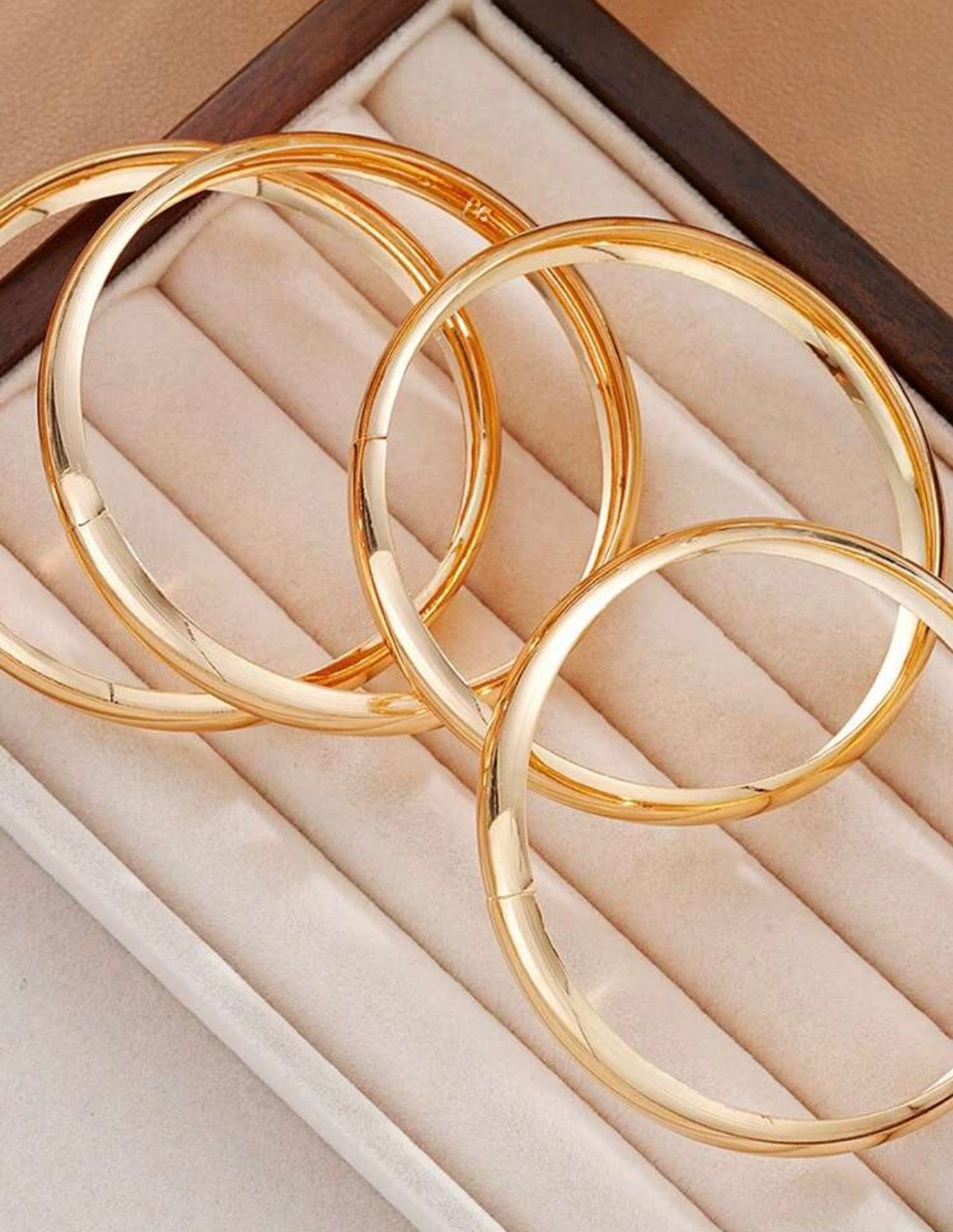 Gold bangles (set of 4)