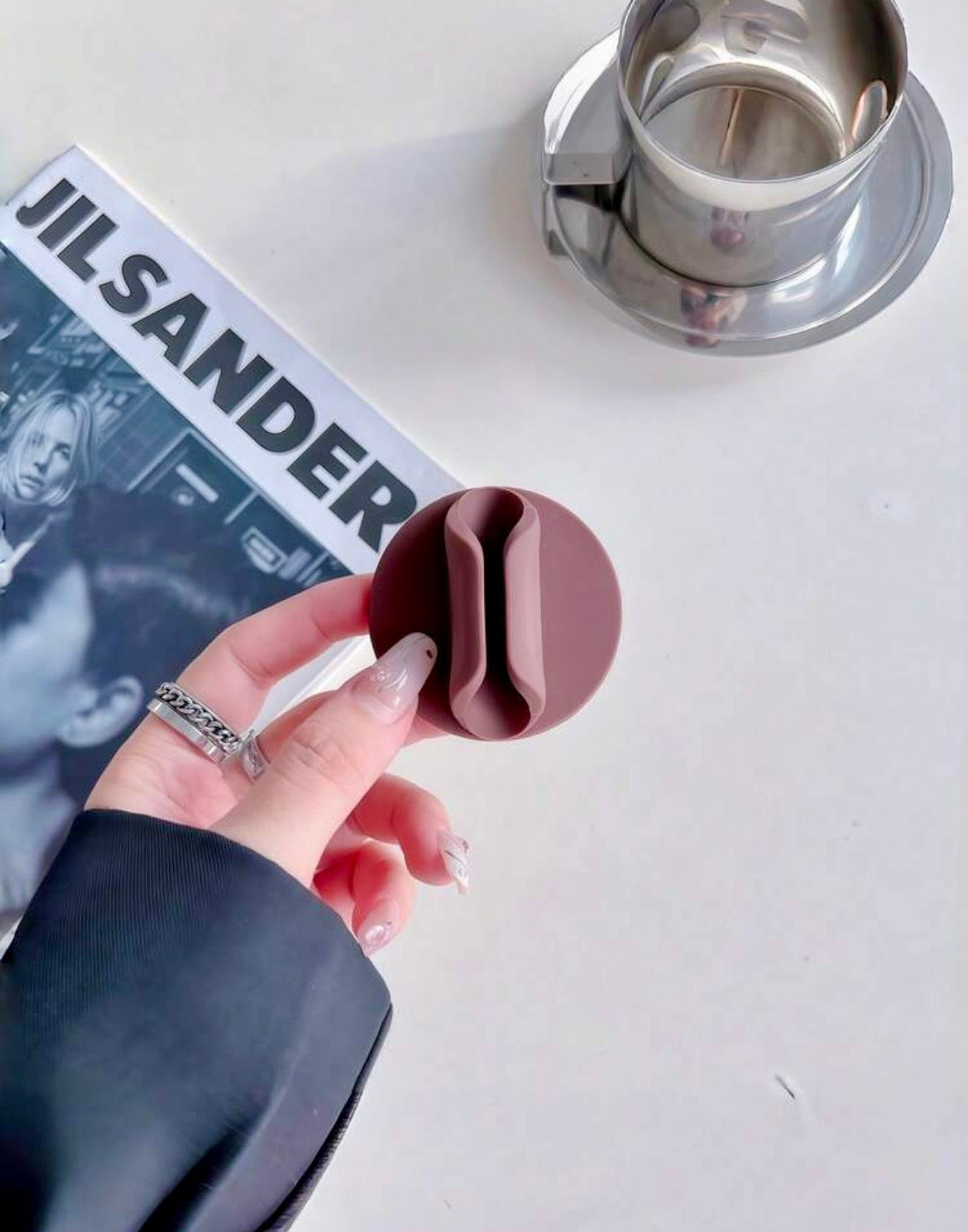Lip gloss shaped phone holder