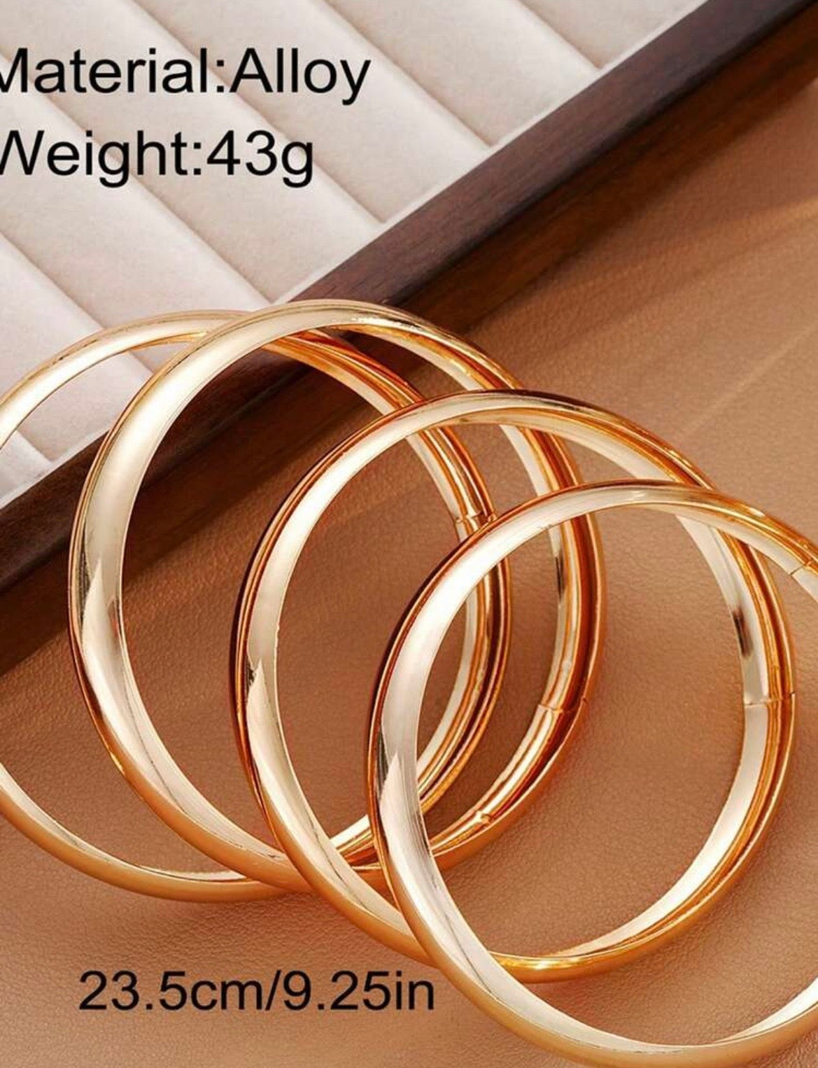 Gold bangles (set of 4)