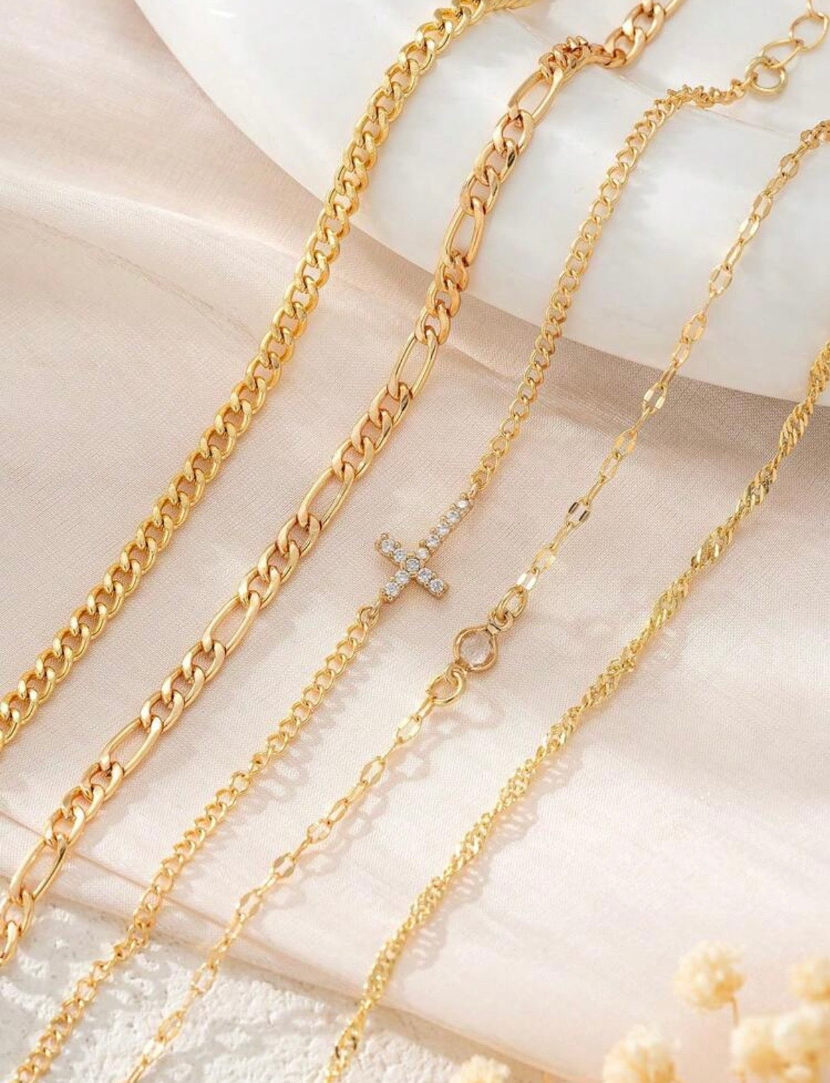 Multilayered cross bracelet